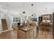 Inviting space connecting kitchen and dining areas, perfect for modern living and entertaining at 4001 Corrine Dr, Orlando, FL 32814