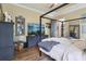 Cozy main bedroom with a decorative bed frame, stylish furnishings, and a serene atmosphere at 4001 Corrine Dr, Orlando, FL 32814