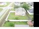 An aerial view of a home in a fenced yard at 401 Magpie Ct, Kissimmee, FL 34759