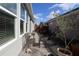 Charming brick patio with comfortable seating, offering a peaceful outdoor retreat with views of the surrounding landscape at 406 Alcove Dr, Groveland, FL 34736