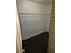 Walk-in closet features wire shelving and modern wood-style flooring at 4061 Kirkland Blvd, Orlando, FL 32811