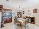 Charming dining room with a chandelier and built-in cabinetry for storage at 4432 Freedom Rd, Kissimmee, FL 34746