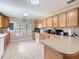 Spacious kitchen with ample counter space and natural light from window at 4432 Freedom Rd, Kissimmee, FL 34746