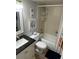 Bathroom with tiled shower and tub, granite countertop and modern decor at 4453 S Atlantic Ave # 602, Ponce Inlet, FL 32127