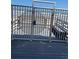 Community beach access with secure metal gate and bench at 4453 S Atlantic Ave # 602, Ponce Inlet, FL 32127