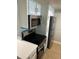 Kitchen with white cabinetry, stainless steel appliances, and a tile floor at 4453 S Atlantic Ave # 602, Ponce Inlet, FL 32127