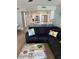 Bright and airy living room featuring neutral tones and modern decor at 4453 S Atlantic Ave # 602, Ponce Inlet, FL 32127