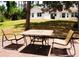 Cozy patio area with outdoor seating, perfect for enjoying the serene backyard view at 548 Glen Haven Dr, Deltona, FL 32738