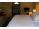 This is a bedroom with a desk and a full view into the bathroom area at 548 Glen Haven Dr, Deltona, FL 32738