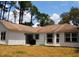 This is a house with a large backyard, and a patio area at 548 Glen Haven Dr, Deltona, FL 32738