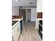 Open kitchen design, offering a view of the living area, blending cooking and living spaces at 5540 Devonbriar Way # 103, Orlando, FL 32822