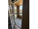 Enclosed patio with views of the surrounding community from inside the screened-in room at 5540 Devonbriar Way # 103, Orlando, FL 32822