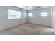 A sun-filled bedroom featuring three windows that bring in great light at 607 W Club Blvd, Lake Mary, FL 32746