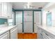 Well-lit kitchen featuring white cabinets, modern appliances, and an island at 607 W Club Blvd, Lake Mary, FL 32746