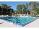 Spacious community pool with ample seating and lush landscaping at 607 W Club Blvd, Lake Mary, FL 32746
