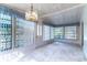 Sunroom featuring white vertical blinds and ample natural light to showcase outdoor view at 607 W Club Blvd, Lake Mary, FL 32746