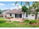 Private backyard features brick patio and mature landscaping at 635 Holbrook Cir, Lake Mary, FL 32746