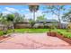 Brick patio and meticulously maintained lawn in a fully-fenced back yard at 635 Holbrook Cir, Lake Mary, FL 32746