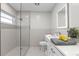 Bathroom features a double sink vanity, illuminated mirror, glass enclosed shower and nice decor at 635 Holbrook Cir, Lake Mary, FL 32746