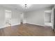 Spacious bedroom featuring modern light fixture and hardwood flooring throughout at 635 Holbrook Cir, Lake Mary, FL 32746
