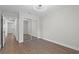 Bright bedroom features wood floors, ceiling fan, and sliding mirror closet doors at 635 Holbrook Cir, Lake Mary, FL 32746