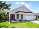Charming single-story home featuring a well-maintained lawn and meticulously landscaped entryway at 635 Holbrook Cir, Lake Mary, FL 32746
