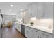 Bright kitchen with white cabinets, stainless steel appliances, and breakfast nook at 635 Holbrook Cir, Lake Mary, FL 32746