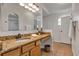 Bathroom featuring a granite countertop vanity, and walk in closet at 638 Sun Bluff Ln, Apopka, FL 32712