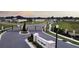 Elegant gated community entrance with manicured landscaping at 6686 Treymont Dr, Lakeland, FL 33813