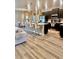 Stylish kitchen featuring a large island with seating and modern appliances, perfect for entertaining at 6686 Treymont Dr, Lakeland, FL 33813