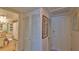Hallway features a bathroom, a closet, and a door at 717 S Beach St # 205C, Daytona Beach, FL 32114