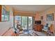 Comfortable living room with lots of natural light and a view of the greenery at 717 S Beach St # 205C, Daytona Beach, FL 32114