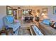 Spacious living room and dining area with tile floors and comfortable furniture at 717 S Beach St # 205C, Daytona Beach, FL 32114