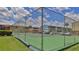 Well-maintained tennis court within a residential community, offering an active and engaging recreational amenity at 717 S Beach St # 205C, Daytona Beach, FL 32114