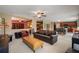 Spacious living area with neutral carpet, modern decor, and ample natural light at 7233 Mystic Brook Way, Davenport, FL 33896