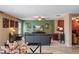 Stylish living room showcasing contemporary furnishings and tasteful decor at 7233 Mystic Brook Way, Davenport, FL 33896