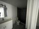 Bathroom with white vanity and tile shower stall at 7604 Forest City Rd # 11, Orlando, FL 32810