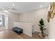 Bright upstairs hallway with bench seating and access to bedrooms at 772 Driving Range Ct, Kissimmee, FL 34747