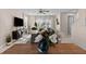 Open living area and dining room with bright natural light and modern decor at 772 Driving Range Ct, Kissimmee, FL 34747
