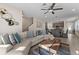 Comfortable living room flows into kitchen; showcases modern decor and open-concept design at 772 Driving Range Ct, Kissimmee, FL 34747