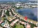 Neighborhood view of tree-lined streets, waterfront property, and convenient location to commercial areas at 8515 Saint Marino Blvd, Orlando, FL 32836