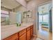 Bright bathroom with vanity, a glass-enclosed shower, and stylish fixtures at 8515 Saint Marino Blvd, Orlando, FL 32836