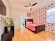 Bedroom featuring modern decor and a ceiling fan, plus an ensuite bath at 8515 Saint Marino Blvd, Orlando, FL 32836