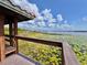 Scenic view from inside the gazebo looking over a lily pad covered lake at 8515 Saint Marino Blvd, Orlando, FL 32836