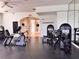 Well-equipped gym with modern exercise machines and an open layout promoting a healthy lifestyle at 8515 Saint Marino Blvd, Orlando, FL 32836