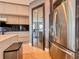 Modern kitchen featuring stainless steel appliances, sleek cabinetry, and a stylish backsplash at 8515 Saint Marino Blvd, Orlando, FL 32836