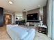 Stylish living room with a modern entertainment setup, comfortable seating, and a sleek glass coffee table at 8515 Saint Marino Blvd, Orlando, FL 32836