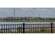 View of the neighborhood and lake with the Wheel at ICON Park visible in the background at 8515 Saint Marino Blvd, Orlando, FL 32836