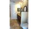 Bathroom with vanity, sleek counter, and toilet at 8613 Edge O Woods Ct, Orlando, FL 32819