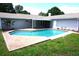 Private backyard pool with ample patio space, perfect for outdoor entertaining at 8613 Edge O Woods Ct, Orlando, FL 32819